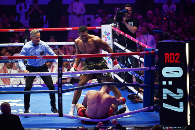 britains-anthony-joshua-knocks-down-albanias-kristian-prenga-during-their-heavyweight-title-fight-in-jeddah-saudi-arabia-sunday-july-26-2026-ap-photoali-issa