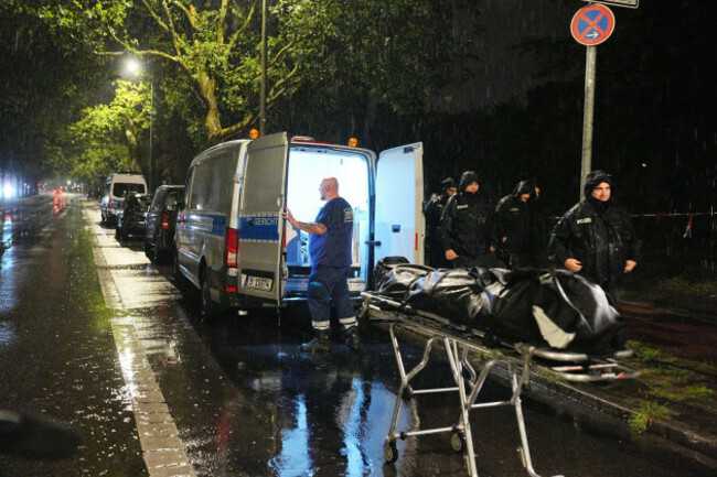 a-forensic-investigator-carries-a-body-believed-to-be-of-the-suspect-of-the-berlin-pride-attack-after-according-to-authorities-he-was-shot-and-killed-by-police-during-a-confrontation-on-sunday-in-a
