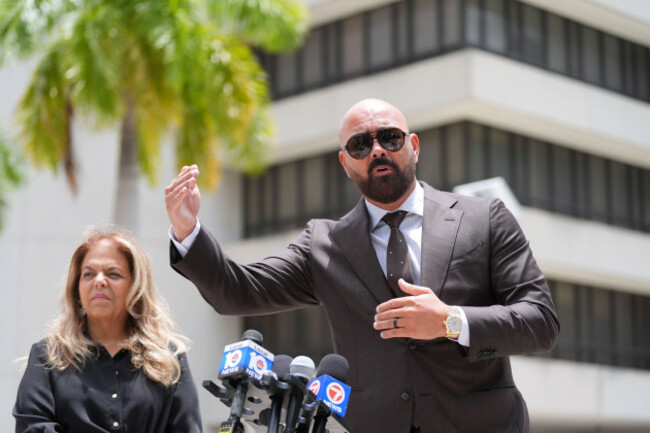 attorneys-joseph-mcbride-right-and-jackie-perczek-representing-andrew-and-tristan-tate-as-they-fight-extradition-to-the-united-kingdom-on-charges-of-rape-and-sex-trafficking-speak-to-the-media-out
