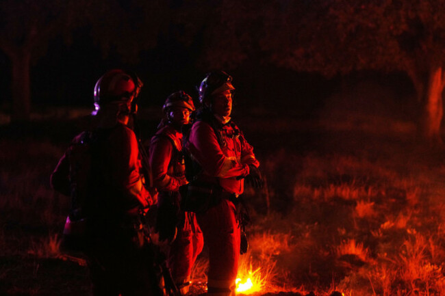 firefighters-use-controlled-burning-to-halt-a-wildfire-that-continues-to-spread-near-cebreros-avila-province-spain-tuesday-july-28-2026-ap-photomanu-fernandez