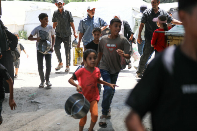 al-nuseirat-camp-gaza-strip-july-25-2026-a-charity-kitchen-in-al-nuseirat-continues-to-distribute-hot-meals-to-displaced-palestinians-amid-a-severe-hunger-crisis-driven-by-ongoing-restrictions-o