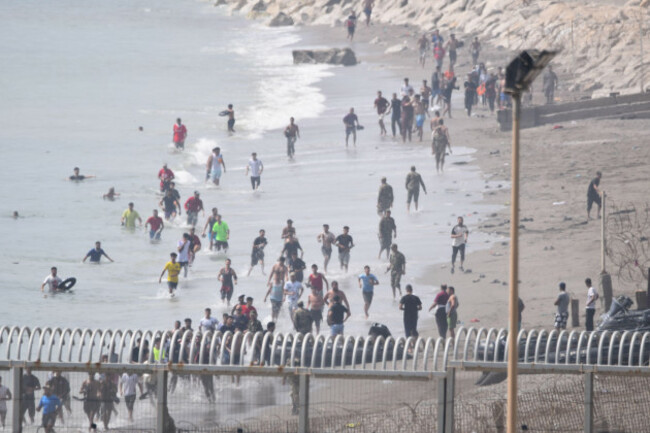 several-migrants-are-attempting-to-swim-across-the-border-on-30-july-2026-in-ceuta-spain-hundreds-of-people-of-maghreb-origin-have-crossed-into-ceuta-from-morocco-this-morning-either-by-swimming-o