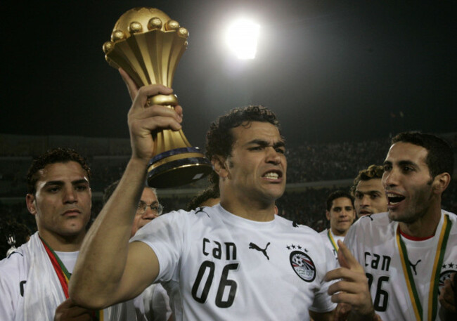 egypts-soccer-team-players-from-left-amr-zaki-essam-al-hadari-and-mohamed-aboutrika-celebrate-with-the-african-nations-cup-trophy-after-the-ceremony-at-the-end-of-the-soccer-match-against-ivory-coa