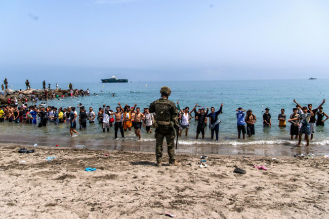 spanish-army-soldiers-block-access-to-the-beach-for-people-crossing-from-morocco-into-the-spanish-enclave-of-ceuta-friday-july-31-2026-ap-photoantonio-sempere