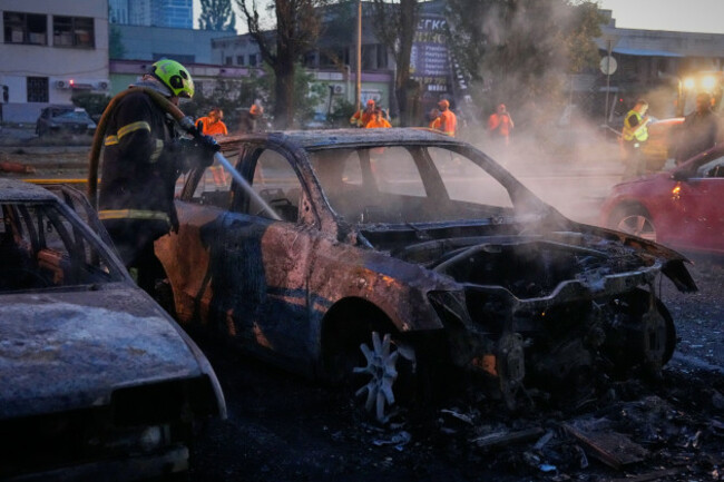 emergency-services-personnel-work-to-extinguish-a-fire-following-russian-missile-attacks-in-kyiv-ukraine-saturday-aug-1-2026-ap-photoefrem-lukatsky