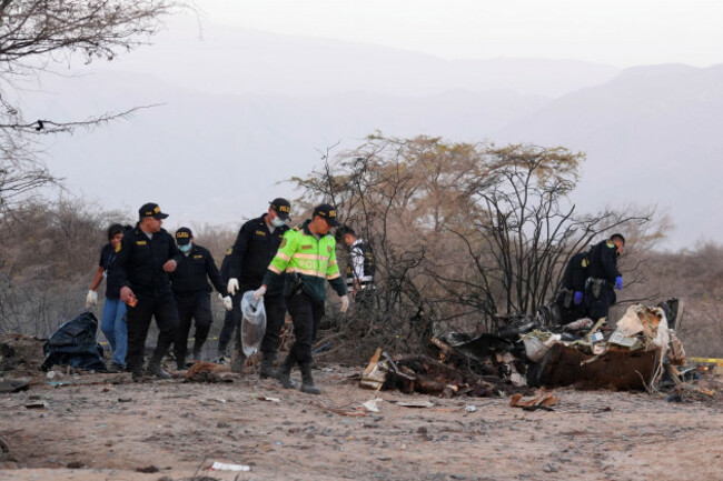 police-inspect-the-wreckage-of-a-plane-that-crashed-during-a-sightseeing-flight-carrying-tourists-over-the-nazca-lines-in-peru-saturday-aug-1-2026-ap-photogenry-bautista