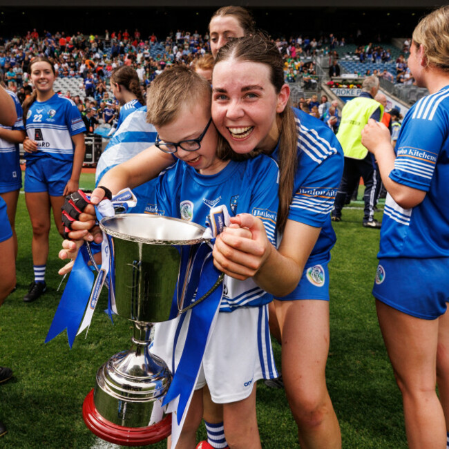 aimee-collier-and-her-brother-aaron-celebrate-with-the-kay-mills-cup