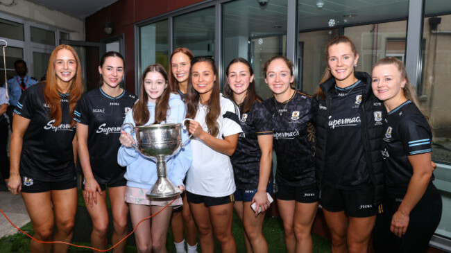 megan-taylor-with-the-galway-team-and-the-brendan-martin-cup
