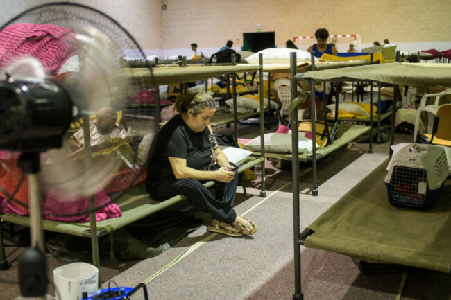 evacuees-from-southwestern-madrid-wildfires-rest-at-a-temporary-shelter-in-villamanta-sports-center-spain