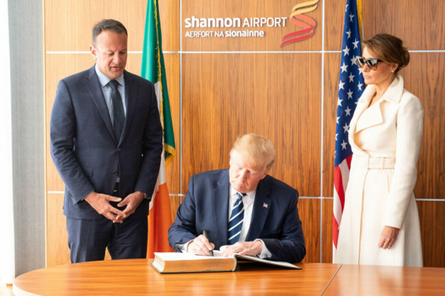 president-donald-j-trump-joined-by-first-lady-melania-trump-and-irish-prime-minister-leo-varadkar-signs-the-guestbook-at-shannon-airport-in-ireland-on-june-5-2019-during-an-official-visit-to-the