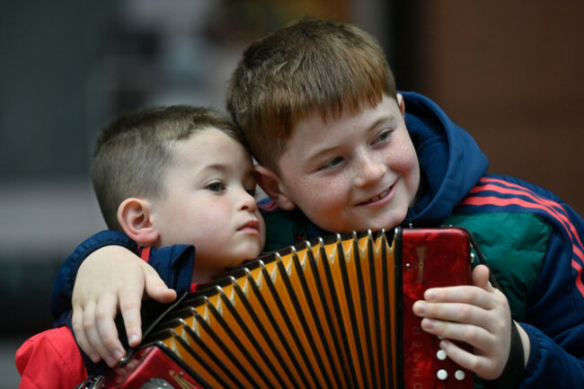 brothers-conall-left-and-daithi-corcoran-on-the-final-day-of-the-fleadh-cheoil-na-heireann-2026-in-belfast-a-week-of-song-dance-and-culture-as-part-of-the-worlds-largest-celebration-of-tradition