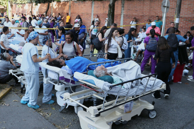 patients-are-evacuated-outside-a-hospital-after-an-earthquake-struck-cali-colombia-monday-aug-10-2026-ap-photosantiago-saldarriaga