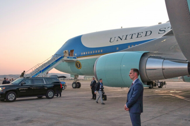 a-catering-truck-is-visible-parked-on-the-opposite-side-of-air-force-one-on-the-tarmac-after-u-s-president-donald-trump-boarded-the-plane-following-the-nato-summit-at-ankara-international-airport-in
