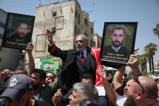 people-celebrate-after-a-syrian-court-sentenced-atef-najib-a-cousin-of-ousted-president-bashar-assad-to-death-for-overseeing-a-crackdown-in-daraa-that-helped-spark-syrias-uprising-and-civil-war-wh