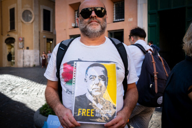 rome-rm-italy-10th-july-2026-activists-from-the-group-health-workers-for-gaza-are-holding-a-rally-in-front-of-montecitorio-the-chamber-of-deputies-to-demand-the-release-of-dr-hussam-abu-safiya