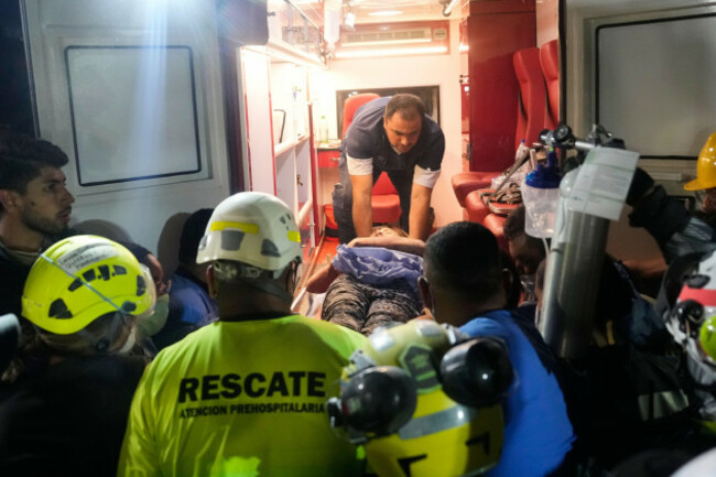 rescue-workers-carry-a-survivor-daniela-largo-after-pulling-her-from-the-rubble-the-day-after-an-earthquake-struck-pereira-colombia-tuesday-aug-11-2026-ap-photofernando-vergara
