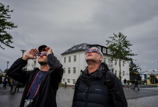 people-use-solar-eclipse-glasses-to-look-up-at-the-sun-ahead-of-a-solar-eclipse-reykjavik-iceland-wednesday-aug-12-2026-ap-photomarco-di-marco