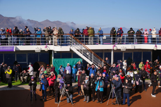 passengers-on-board-the-ambassador-cruise-ship-ambition-watching-the-start-of-the-total-solar-eclipse-off-the-coast-of-greenland-picture-date-wednesday-august-12-2026