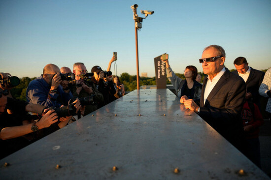 warsaw-poland-12th-aug-2026-polish-prime-minister-donald-tusk-watches-the-partial-solar-eclipse-from-the-rooftop-of-the-copernicus-science-centre-on-august-12-2026-in-warsaw-poland-a-total-sola
