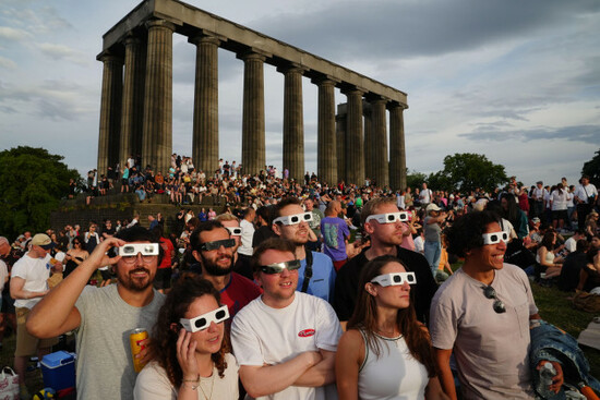 people-gathering-to-watch-the-solar-eclipse-on-calton-hill-edinburgh-the-first-total-solar-eclipse-visible-over-mainland-europe-since-1999-picture-date-wednesday-august-12-2026