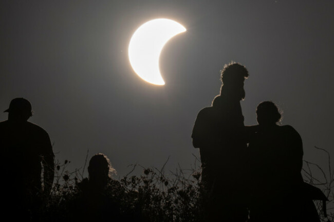 london-uk-12-august-2026-uk-weather-people-watch-a-partial-solar-eclipse-as-seen-from-northala-fields-in-west-london-the-partial-solar-eclipse-commences-at-617pm-reaching-a-maximum-91-4-cov