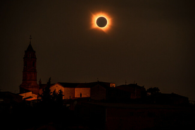 august-12-2026-llardecans-lleida-spain-a-total-solar-eclipse-is-seen-next-to-the-village-church-bell-tower-in-llardecans-lleida-catalonia-spain-on-august-12-2026-the-rare-celestial-event-is