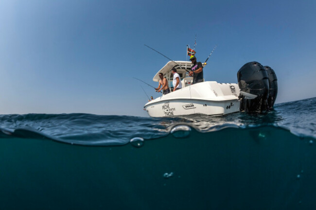 fishing-party-between-friends-the-boat-model-used-here-is-a-boston-whaler-320-outrage-300-horsepower-outboard-mercury-engines