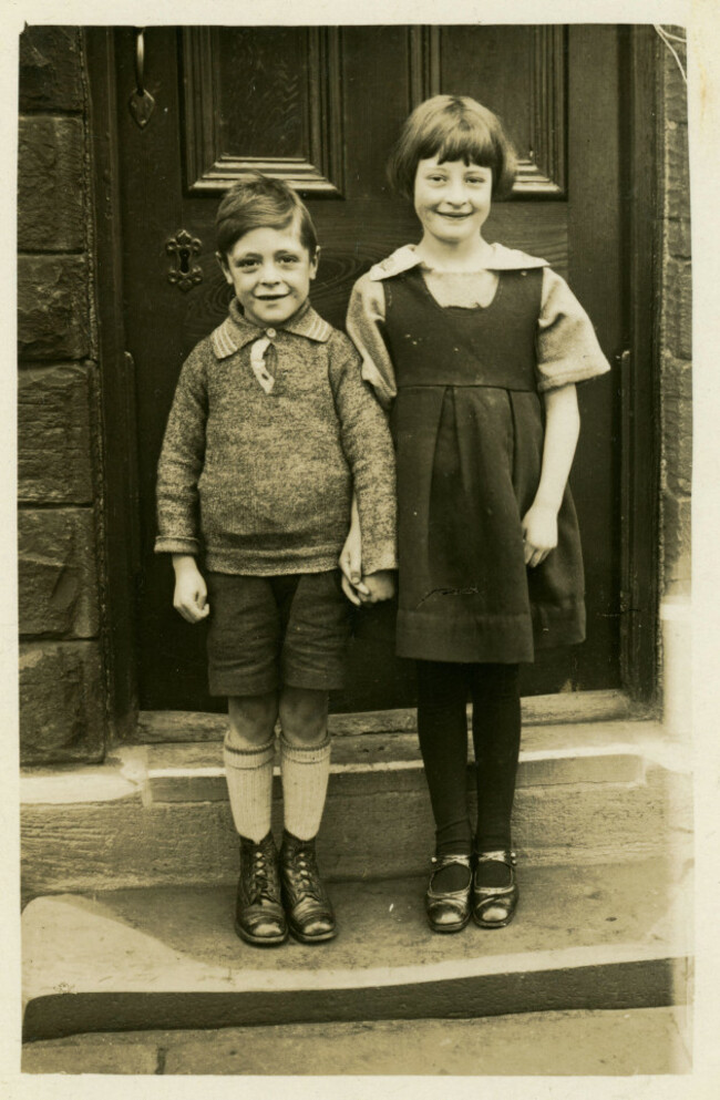 vintage-1900s-1920s-1930s-brother-sister-girl-boy-in-school-uniform-outside-home-1920s-1930s-british-children-first-day-back-to-school-uk