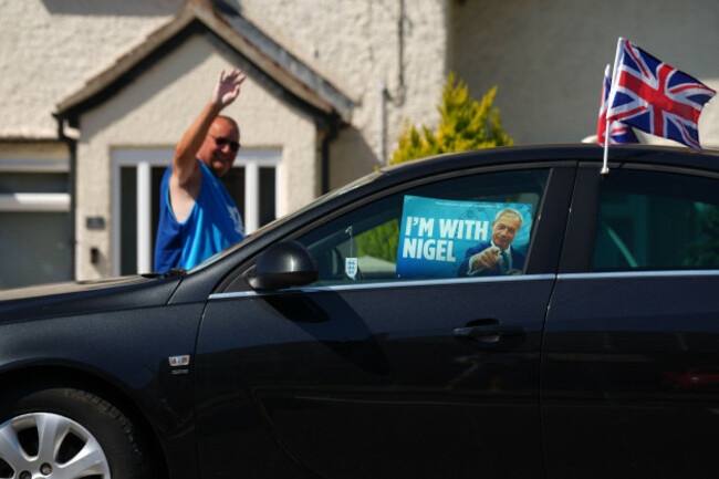a-car-with-a-reform-uk-leader-nigel-farage-poster-in-little-clacton-as-polls-are-open-in-clacton-by-election-the-by-election-was-triggered-by-local-mp-and-reform-uk-leader-nigel-farage-quitting-in-p