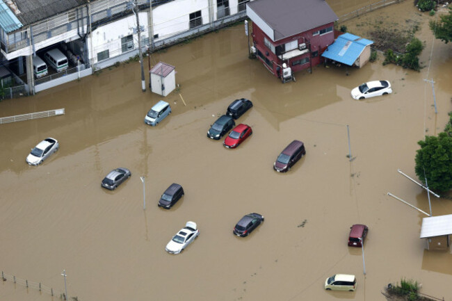 this-aerial-photo-shows-submerged-cars-after-heavy-rain-in-oamishirasato-chiba-prefecture-japan-friday-aug-14-2026-kota-endokyodo-news-via-ap