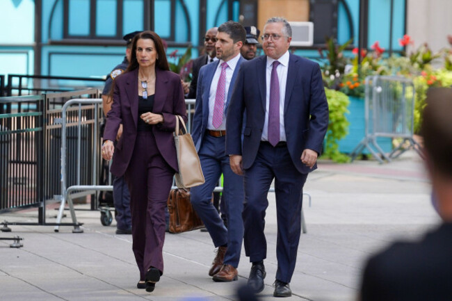 legal-team-of-luigi-mangione-including-karen-friedman-agnifilo-left-and-marc-agnifilo-right-arrive-at-manhattan-federal-court-on-the-day-of-a-hearing-for-mangione-on-friday-aug-14-2026-in-new