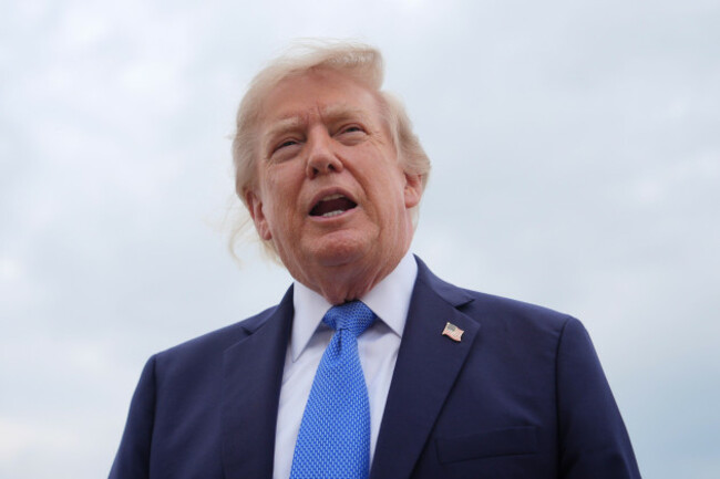 president-donald-trump-speaks-with-reporters-before-boarding-air-force-one-friday-aug-14-2026-at-joint-base-andrews-md-ap-photojulia-demaree-nikhinson