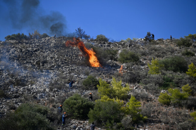 firefighters-battle-a-wildfire-on-the-island-of-salamina-west-of-athens-greece-sunday-aug-16-2026-ap-photomichael-varaklas