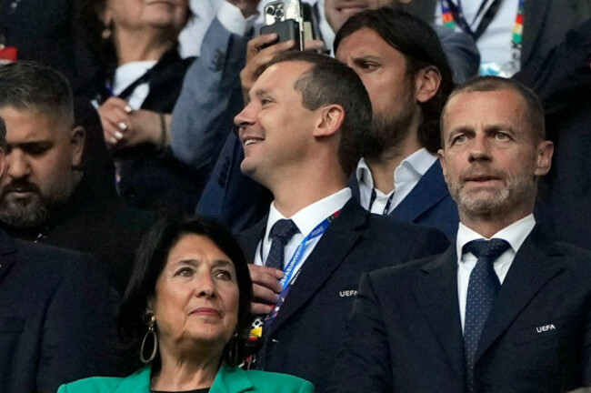 file-uefas-deputy-general-secretary-kevin-lamour-centre-looks-on-as-he-stands-next-to-uefa-president-aleksander-ceferin-right-prior-to-the-start-of-a-group-f-match-between-turkey-and-georgia-at