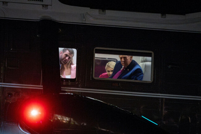 washington-united-states-10th-apr-2026-president-donald-trump-looks-out-the-window-with-eric-trump-executive-vice-president-of-trump-organization-inc-left-and-natalie-harp-executive-assistant