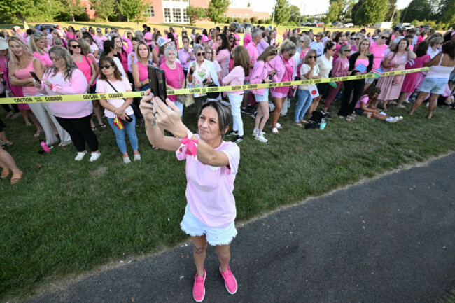 aimee-breault-of-acushnet-mass-live-streams-a-demonstration-in-support-of-lindsay-clancy-outside-plymouth-superior-court-where-clancy-is-on-trial-in-connection-with-the-deaths-of-her-three-childre