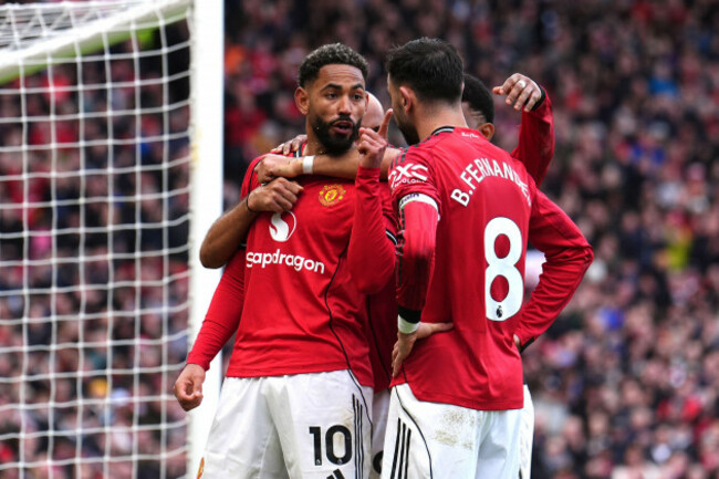 manchester-uniteds-matheus-cunha-left-celebrates-scoring-their-sides-second-goal-of-the-game-with-bruno-fernandes-and-team-mates-during-the-premier-league-match-at-old-trafford-manchester-pictur