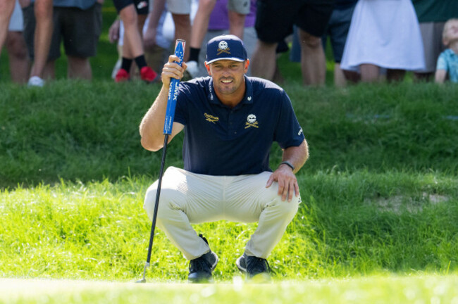 captain-bryson-dechambeau-of-crushers-gc-reads-his-putt-on-the-ninth-green-during-the-final-round-of-liv-golf-indianapolis-at-the-club-at-chatham-hills-on-sunday-august-23-2026-in-westfield-indiana
