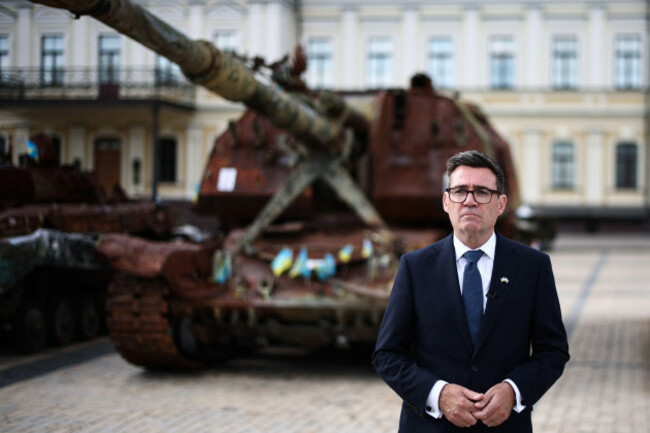britains-prime-minister-andy-burnham-stands-by-destroyed-russian-vehicles-displayed-at-mykhailivska-square-st-michaels-square-in-the-old-part-of-kyiv-monday-aug-24-2026-henry-nichollspool-p