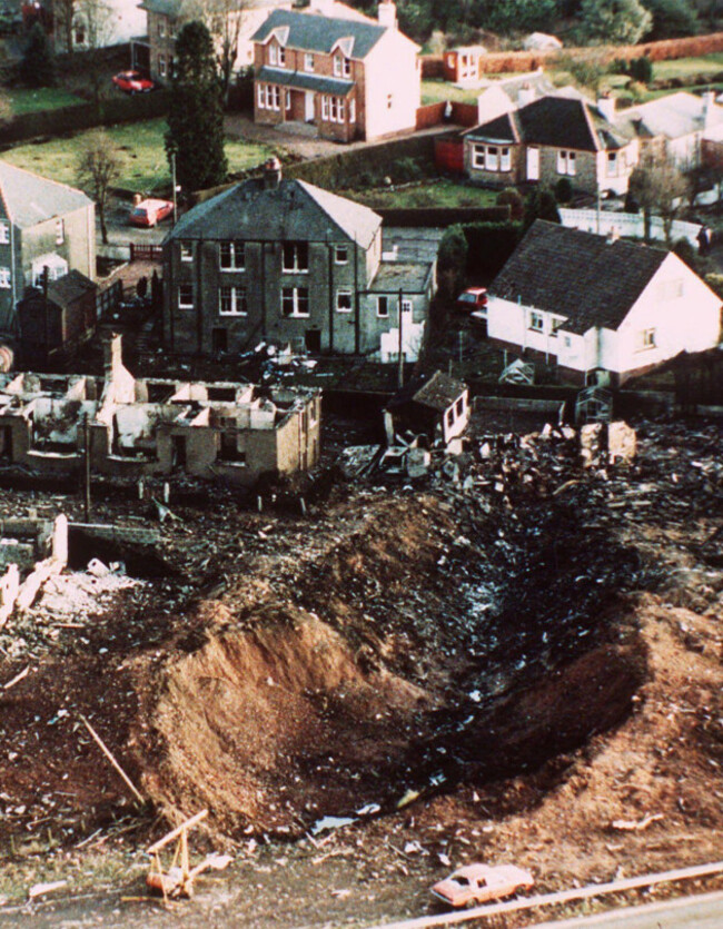 file-this-december-1988-file-photo-shows-wrecked-houses-and-a-deep-gash-in-the-ground-in-the-village-of-lockerbie-scotland-damage-caused-by-the-crash-of-pan-am-flight-103-moammar-gadhafis-death