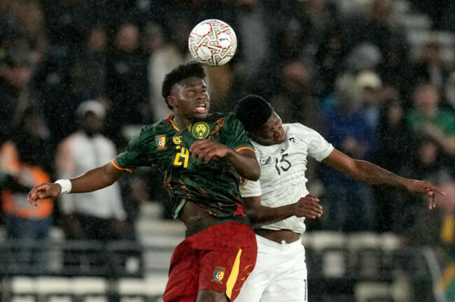 cameroons-carlos-baleba-left-and-south-africas-bathusi-aubaas-challenge-for-the-ball-during-the-africa-cup-of-nations-round-of-16-soccer-match-between-south-africa-and-cameroon-in-rabat-morocco