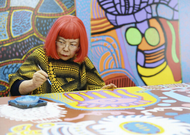 a-japanese-avant-garde-artist-yayoi-kusama-creates-a-new-artwork-in-shinjuku-ward-tokyo-on-february-20-2015-kusama-known-for-abstract-artworks-featuring-surfaces-covered-with-polka-dots-or-mesh