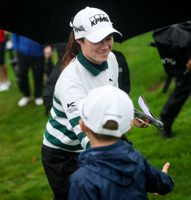 leona-maguire-is-congratulated-by-a-young-fan-after-finishing-her-round