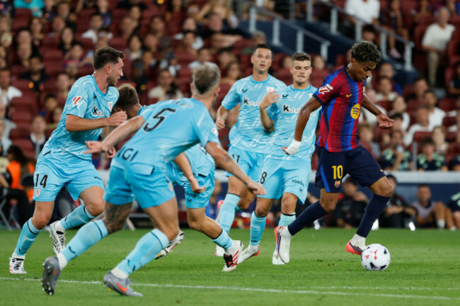barcelonas-lamine-yamal-controls-the-ball-surrounded-by-athletic-players-during-a-spanish-la-liga-soccer-match-between-barcelona-and-athletic-in-barcelona-spain-thursday-aug-27-2026-ap-photoj