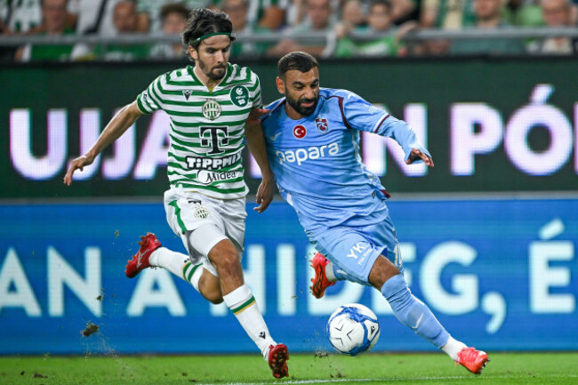 trabzonspors-mohamed-salah-right-and-ftcs-adam-nagy-battle-for-the-ball-during-the-europa-league-soccer-match-between-ferencvarosi-tc-and-trabzonspor-in-budapest-hungary-thursday-aug-27-2026
