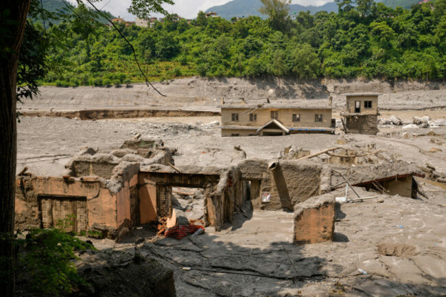 damaged-houses-are-seen-along-the-river-trishuli-following-flash-floods-in-nepals-nuwakot-district-saturday-aug-29-2026-ap-photodar-yasin