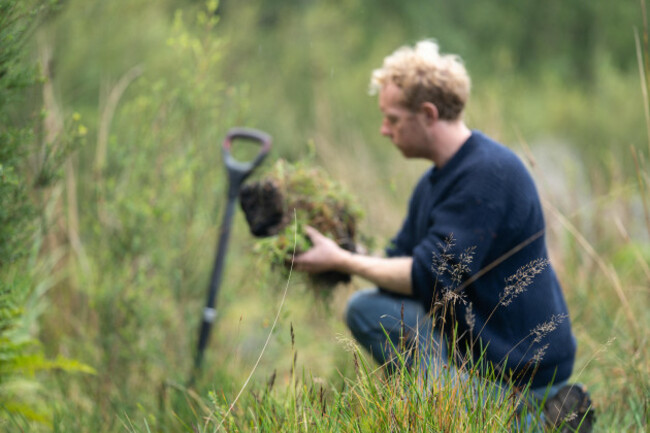 compost-pile-organic-thermophilic-compost-turning-in-tasmania-australiaholding-soil