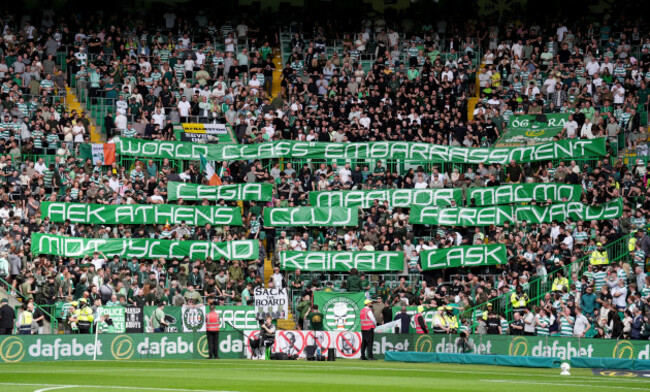 celtic-fans-hold-up-banners-referencing-their-teams-failures-against-teams-in-europe-in-previous-seasons-ahead-of-the-william-hill-premiership-match-at-celtic-park-glasgow-picture-date-saturday-aug
