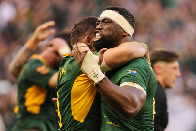 south-africas-captain-siya-kolisi-celebrates-with-his-teammate-after-scoring-a-try-during-a-second-test-rugby-match-between-south-africa-and-new-zealand-in-cape-town-south-africa-saturday-aug-29