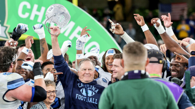 bill-belichick-celebrates-with-the-coachs-award-after-the-match